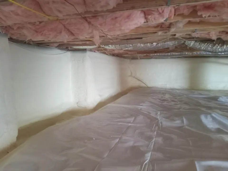Crawl space encapsulation with closed-cell spray foam for Commercial Roof Restoration in Parkwood